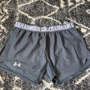 Worn many times, grey under armor shorts.